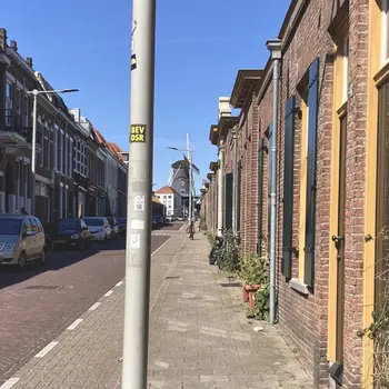 Windmill in Arnhem at the end of a street